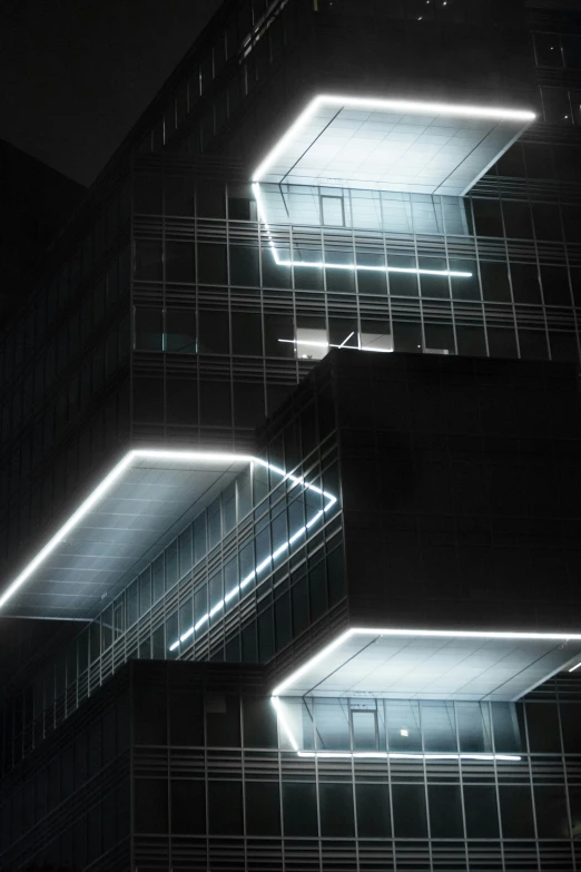 architectural design consisting of bright lights on a darkened surface