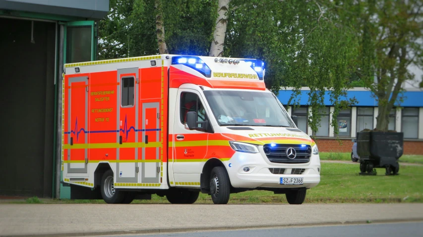 an ambulance car parked on the side of the road