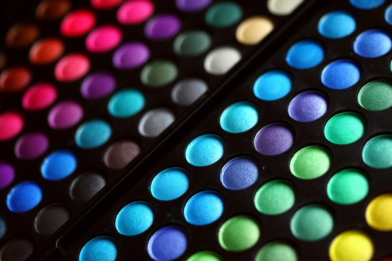 a group of colorful polka dots are arranged together