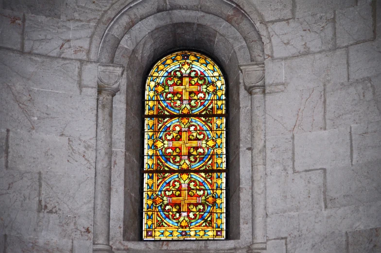 an abstract stained glass window with intricate ornaments