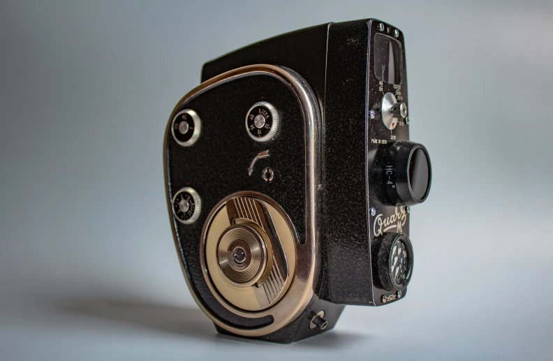 an old fashioned camera is on the white background