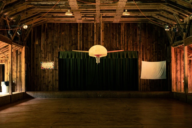 a room with a basketball hoop hanging from the ceiling