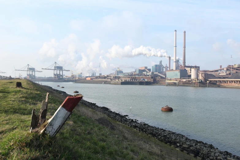 a large body of water near some power plants