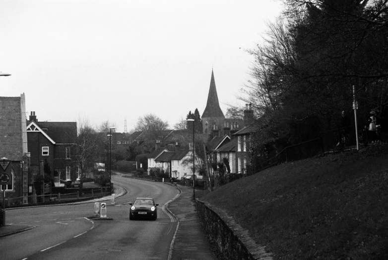 black and white pograph of a road in a town