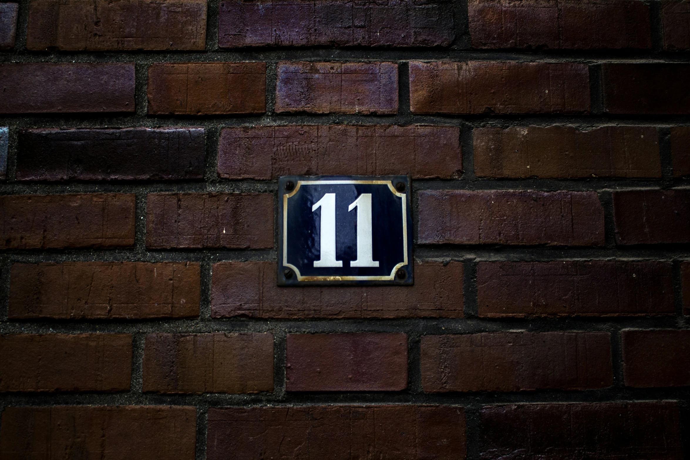 an address plate on the wall to give name plate