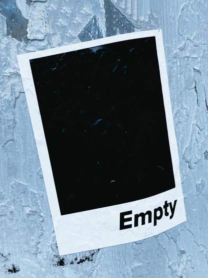 a paper with a black square and the word empty written on it