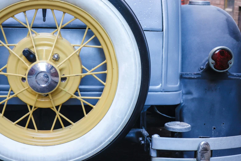 this is a wheel on the rear side of an old model car