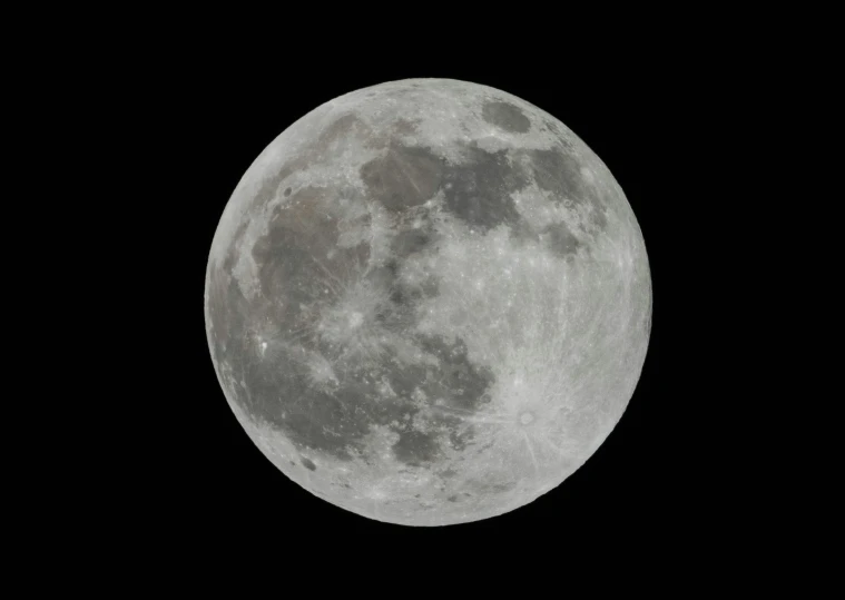 the full moon is shown in dark sky
