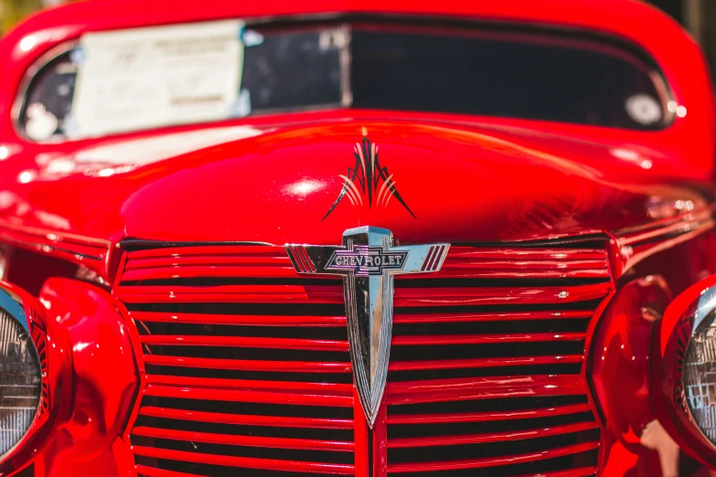 closeup of the front and grille of an antique car