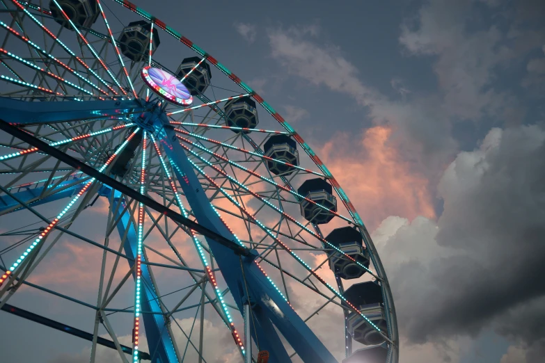 a ferris wheel sitting in the middle of an open field