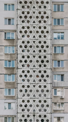 an apartment building has a lot of windows