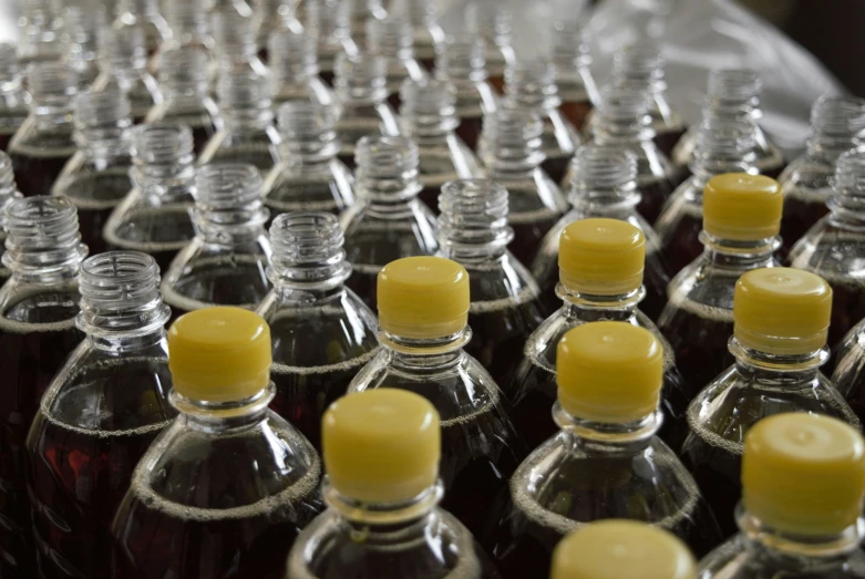 bottles filled with liquid sitting next to each other