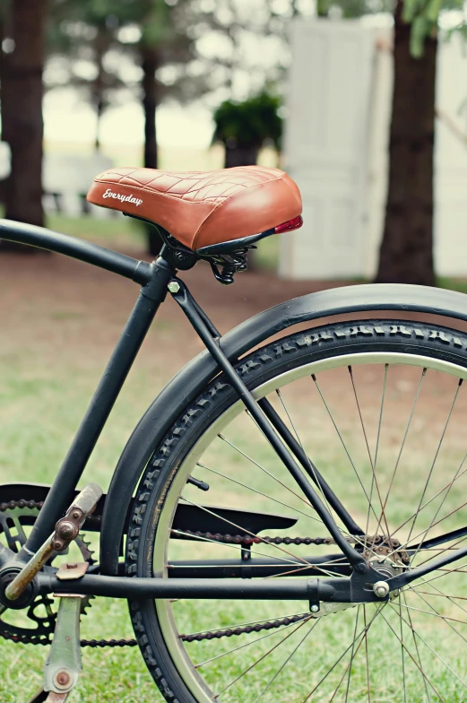 a bike that is standing in the grass