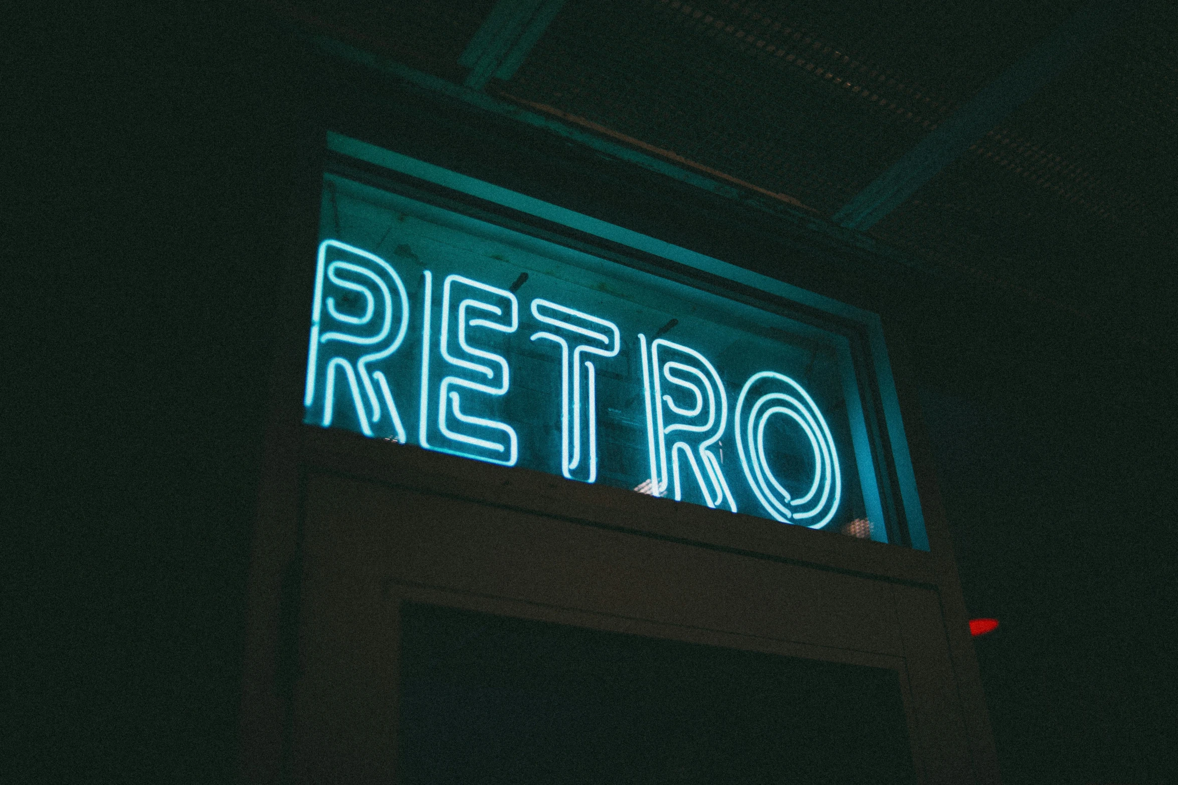 a neon sign that reads retro