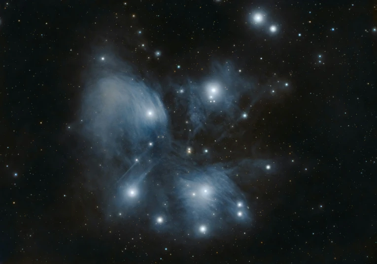 large group of stars in space, all light blue