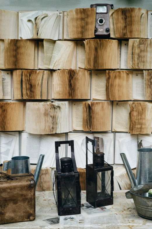 some wood boards stacked together and some with old items