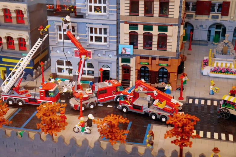 there is an overview of a model set and the toy fire station