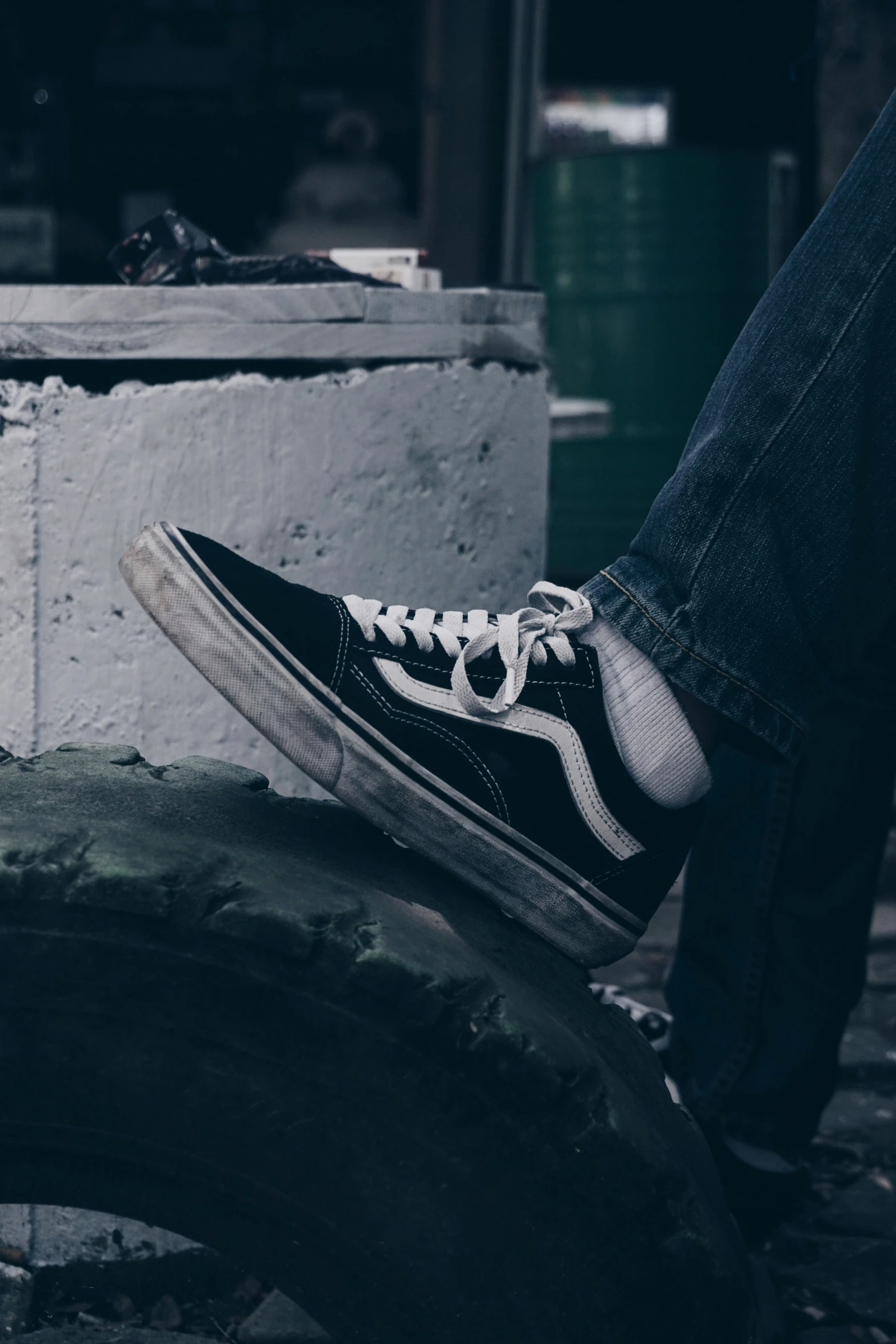 a black and white vans shoe with laces