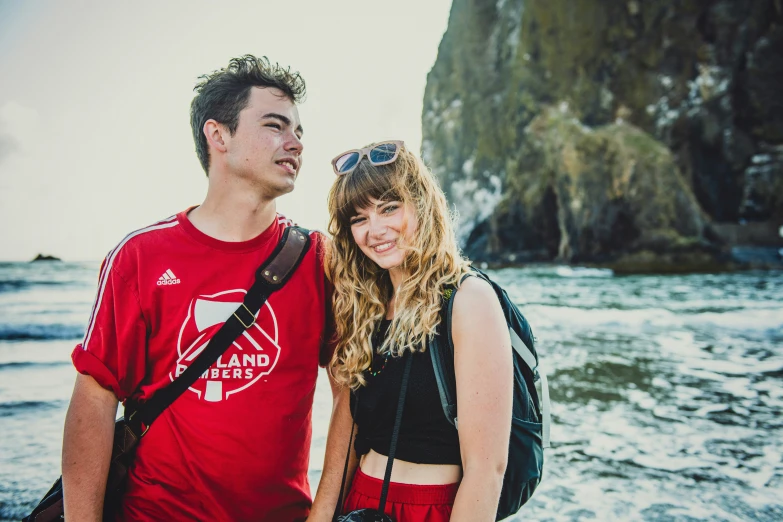 couple taking a po together on the beach