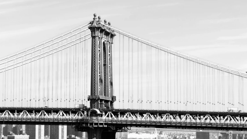 a very tall bridge crossing across the water