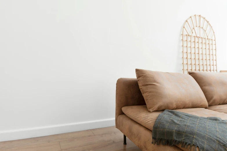 an image of a living room setting with a large sofa