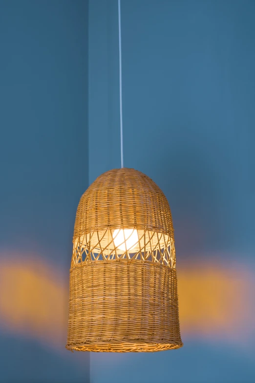 a light hanging from a ceiling in a house