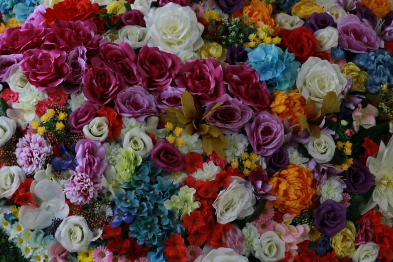 a large bouquet of flowers in different colors