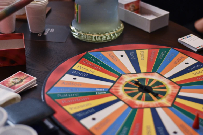 a colorful wheel of fortune sits on a table
