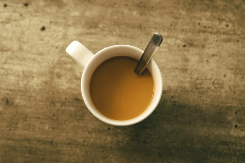 the top view of a cup with a spoon