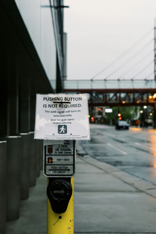 a bus stop sign on a city street