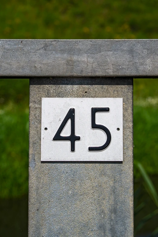 a concrete structure with the number 45 and the date fifteen forty four