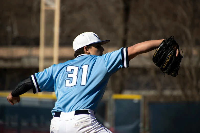 a baseball player getting ready to throw a ball