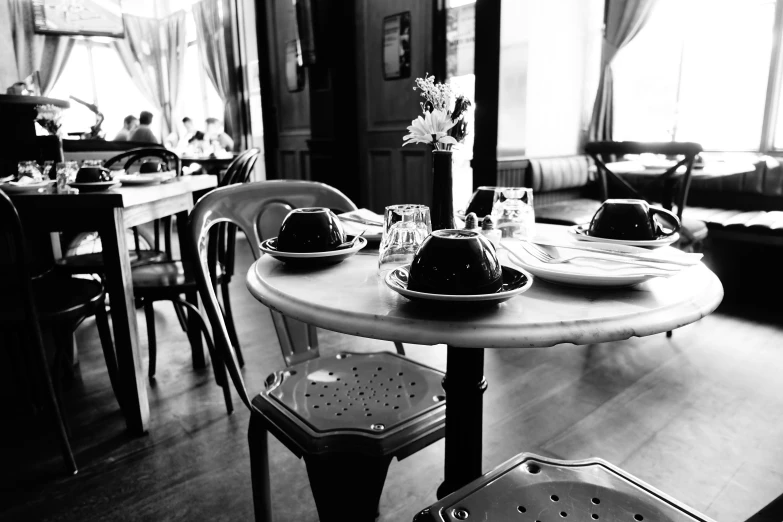 a table with plates and bowls on it