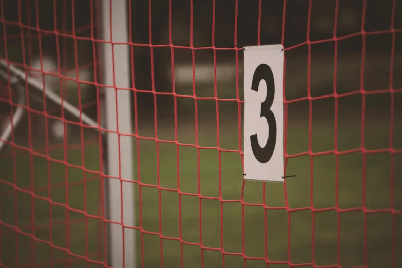 a number 33 sticker is on the front of a goal