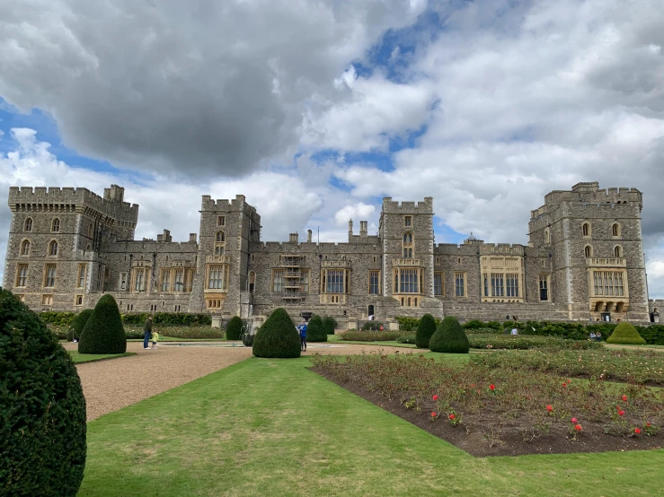 the large castle is built on top of very tall stone