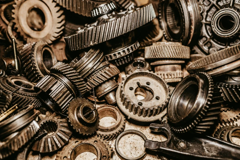 various mechanical cogs and gears in an old time setting