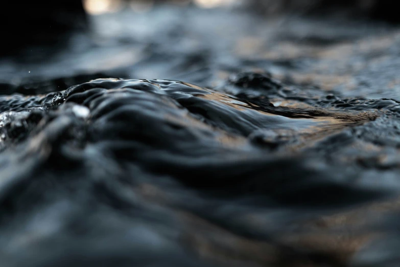 a close up view of water that is swirling