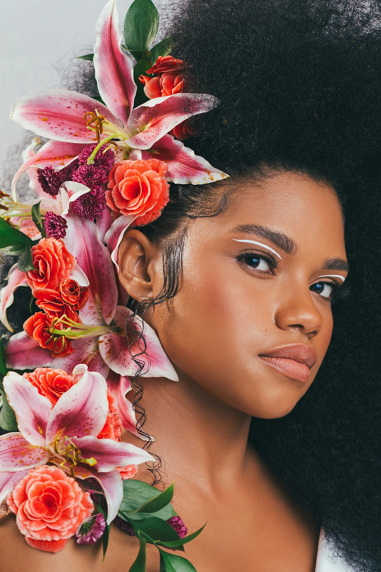 an image of a woman with flowers in her hair