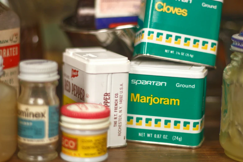 bottles of marroman on a table with containers