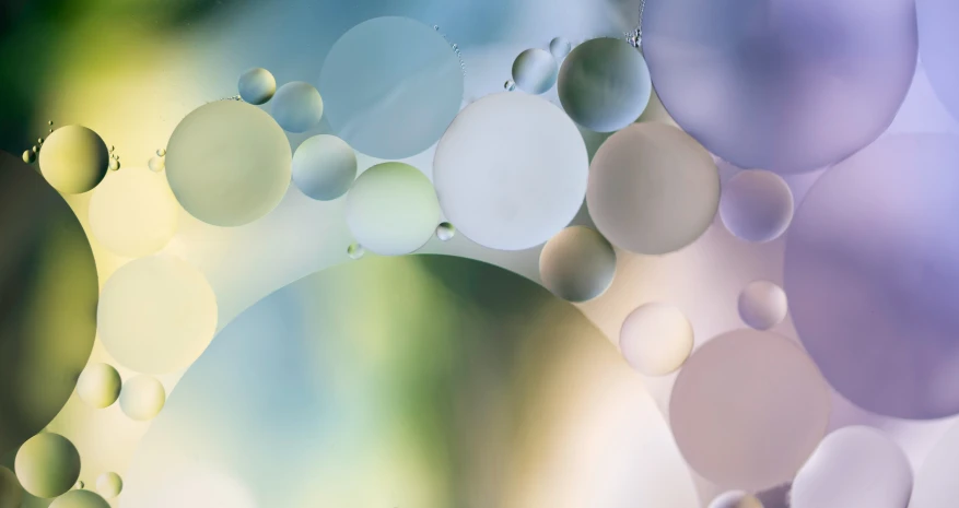 a large picture of many bubbles hanging on a wall