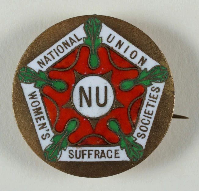 a badge made out of glass with words and an emblem