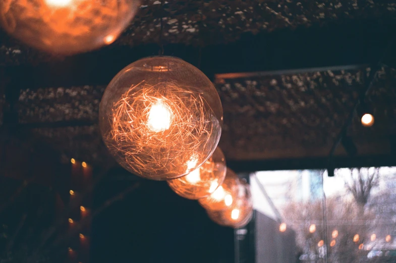 a group of lights suspended from the ceiling