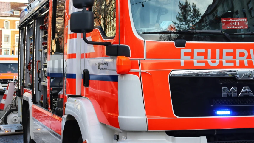 a close - up view of an emergency truck that says'fire and rescue '