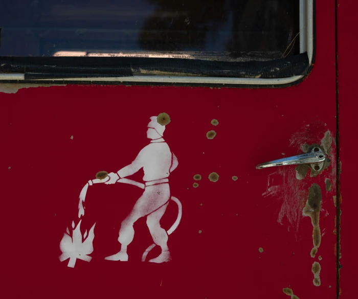 a sticker on the side of a van reading and cooking