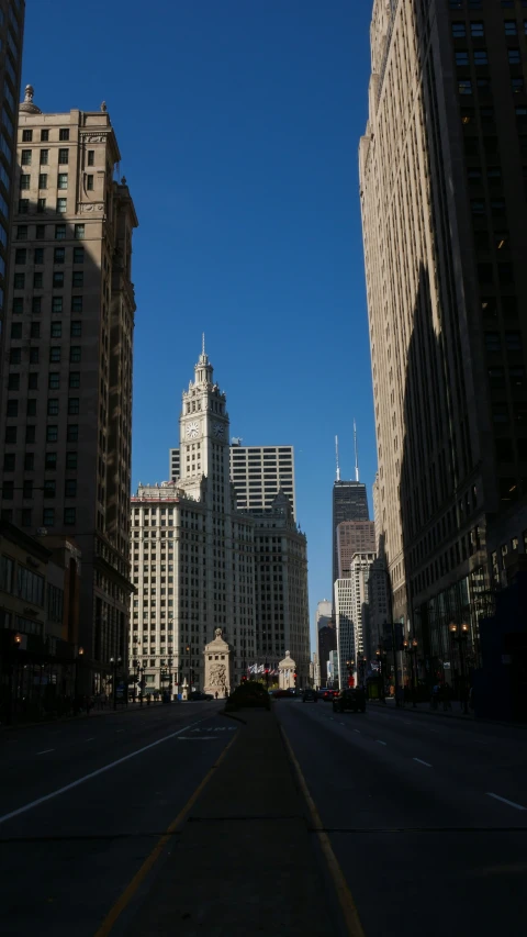 the road is empty of cars in the middle of the city