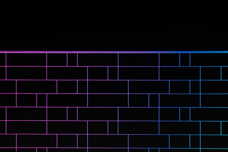 the dark brick wall with neons painted in it