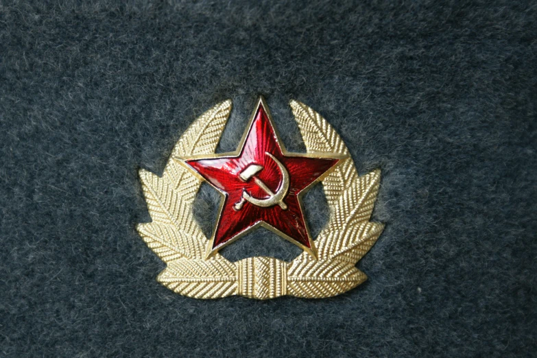 an emblem is shown in red, blue, and white colors