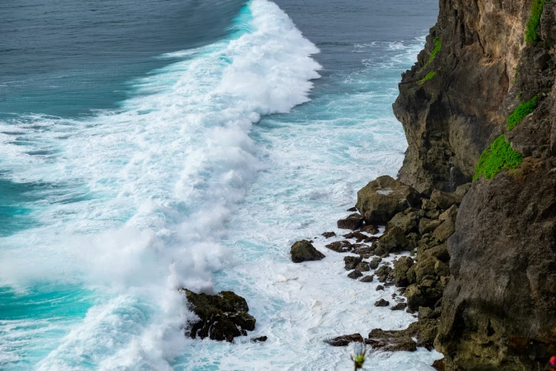 an ocean view looking down at a body of water