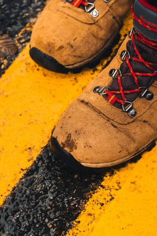 this is an image of someones feet in hiking boots