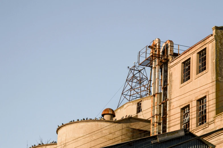 the top portion of a building with lots of scaffolding